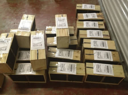 Bees packed into boxes to be
sent through the postal system Bees packed into boxes to be sent through the postal system
